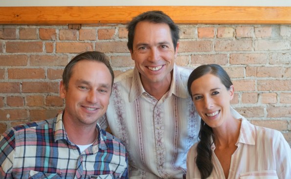 Winemaker Joe Buckel, center, with Palisade growers Brian and Rebecca Cox. Photo by Lisa Moose Levy Kral